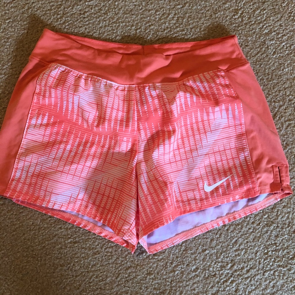 Orange patterned Nike shorts